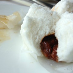 Steamed buns filled with pork.
